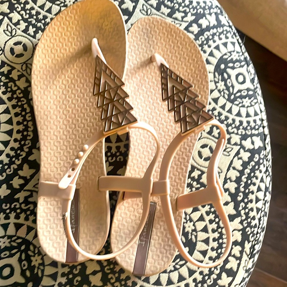 Ipanema sandals with gold accent. Light Peach/Light Cream color. Size 7